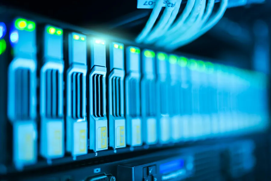 A row of servers in a data centre with status LEDs